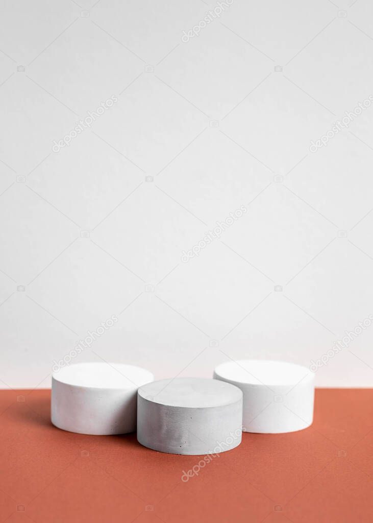 concrete podium on earthy tone background. Pedestal, place for product
