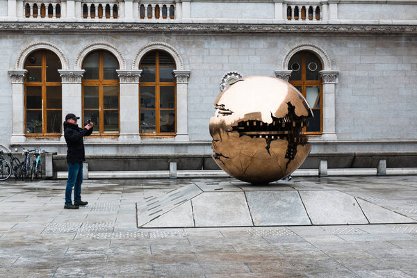 April 12th, 2018, Dublin, Ireland - Sfera con Sfera sculpture outside Berkeley Library at Trinity College, widely considered to be the most prestigious university in Ireland.