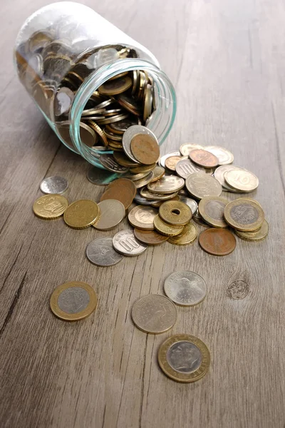 Coins and jar glass. Saving or finance conceptual