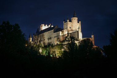 Military Castle of the city of Segovia in the foregroun clipart