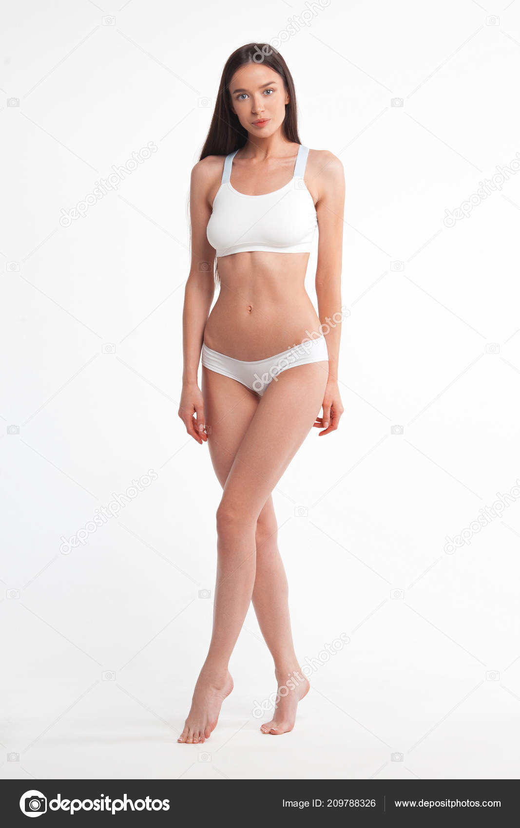 Slim Girl In White Underwear Working Out Stock Photo, Picture and Royalty  Free Image. Image 4606799.