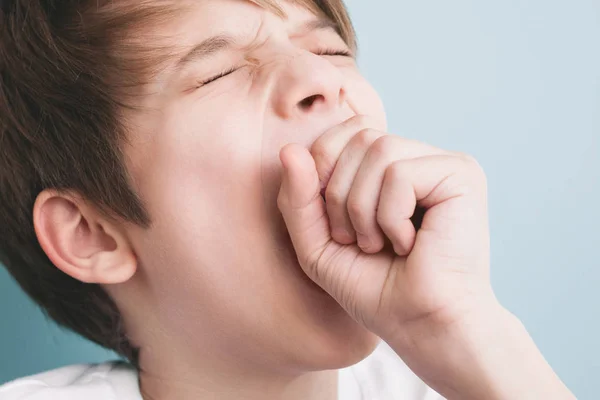 Boy Yawns Wide His Eyes Closed Covering His Mouth His — Stock Photo, Image