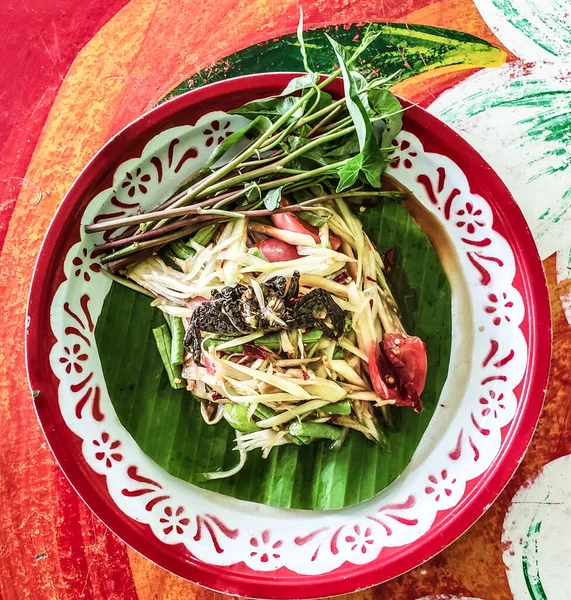 Tayland baharatlı papaya salatası, Tayland adı: