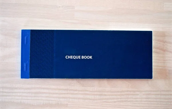 Cheque Book Wooden Background — 图库照片#