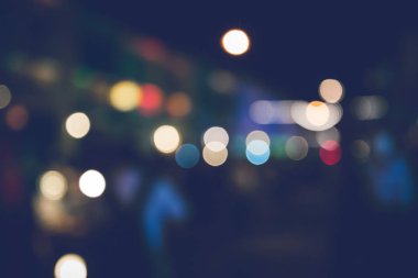 arka plan bulanık bokeh. Işıklar Seremonisi. Gece ışıkları nı aydınlat Kutlamalarda. Bir sürü insan.