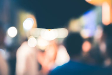 arka plan bulanık bokeh. Işıklar Seremonisi. Gece ışıkları nı aydınlat Kutlamalarda. Bir sürü insan.