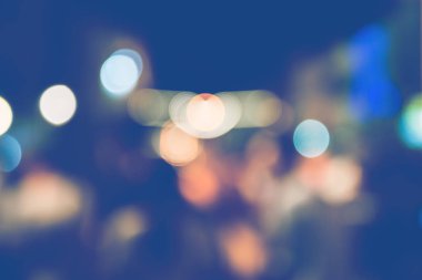 arka plan bulanık bokeh. Işıklar Seremonisi. Gece ışıkları nı aydınlat Kutlamalarda. Bir sürü insan.