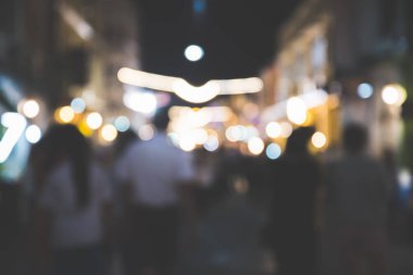 arka plan bulanık bokeh. Işıklar Seremonisi. Gece ışıkları nı aydınlat Kutlamalarda. Bir sürü insan.