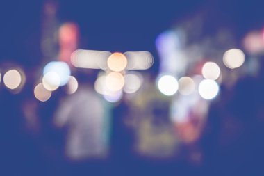 arka plan bulanık bokeh. Işıklar Seremonisi. Gece ışıkları nı aydınlat Kutlamalarda. Bir sürü insan.
