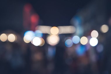 arka plan bulanık bokeh. Işıklar Seremonisi. Gece ışıkları nı aydınlat Kutlamalarda. Bir sürü insan.