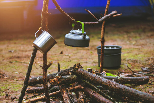 Travel nature relax in the holiday. camping on the moutainIn the wild nature in the rainy season.