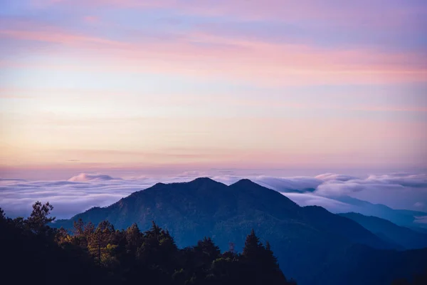 The background of nature with fog on the mountain. In the rainy weather in the countryside. winter — Stock Photo, Image