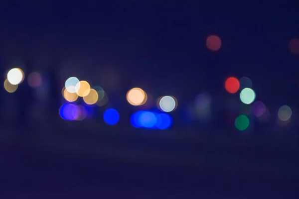 Vintage tone abstract blur image at night with bokeh for background use. Bokeh light and background blurred. — Stock Photo, Image