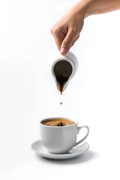 Derramando Uma Xícara Café Sobre Fundo Branco — Fotografia de Stock