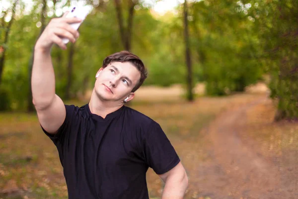 Attractive Young Caucasian Man Dark Hair Makes Selfie Abandoned Park — Stock Photo, Image