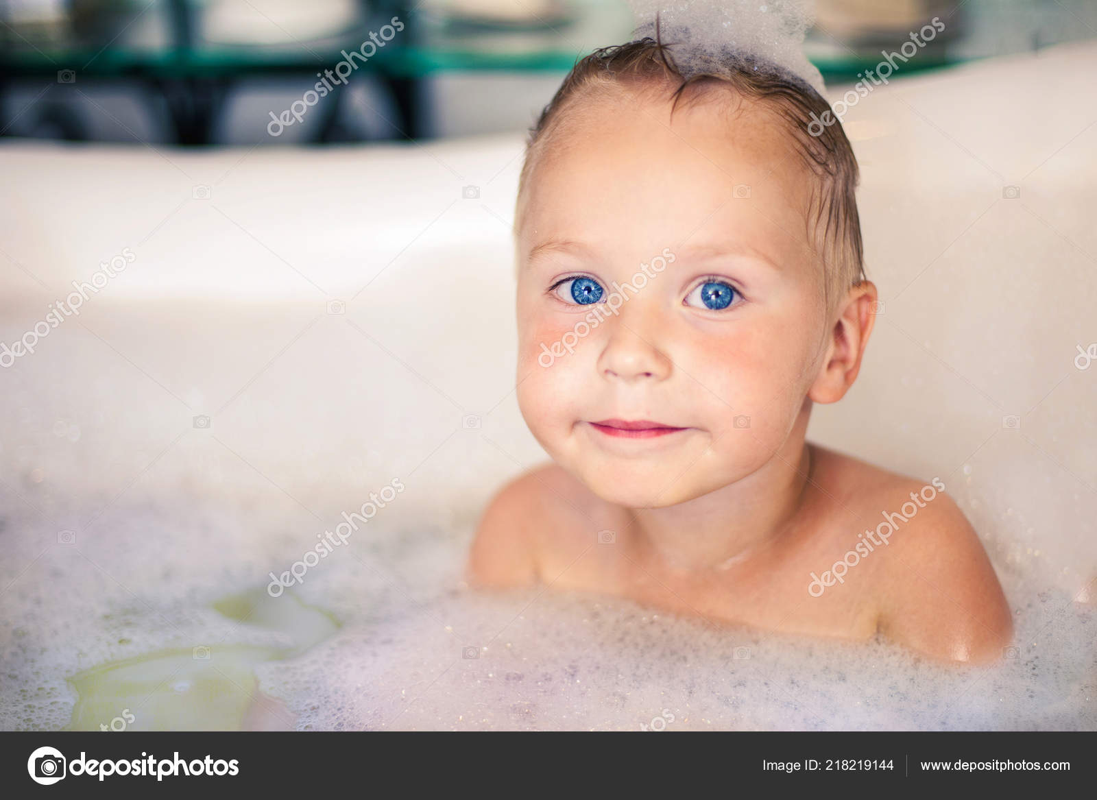 Cute Little Caucasian Boy Bright Blue Eyes Blonde Hair Sits