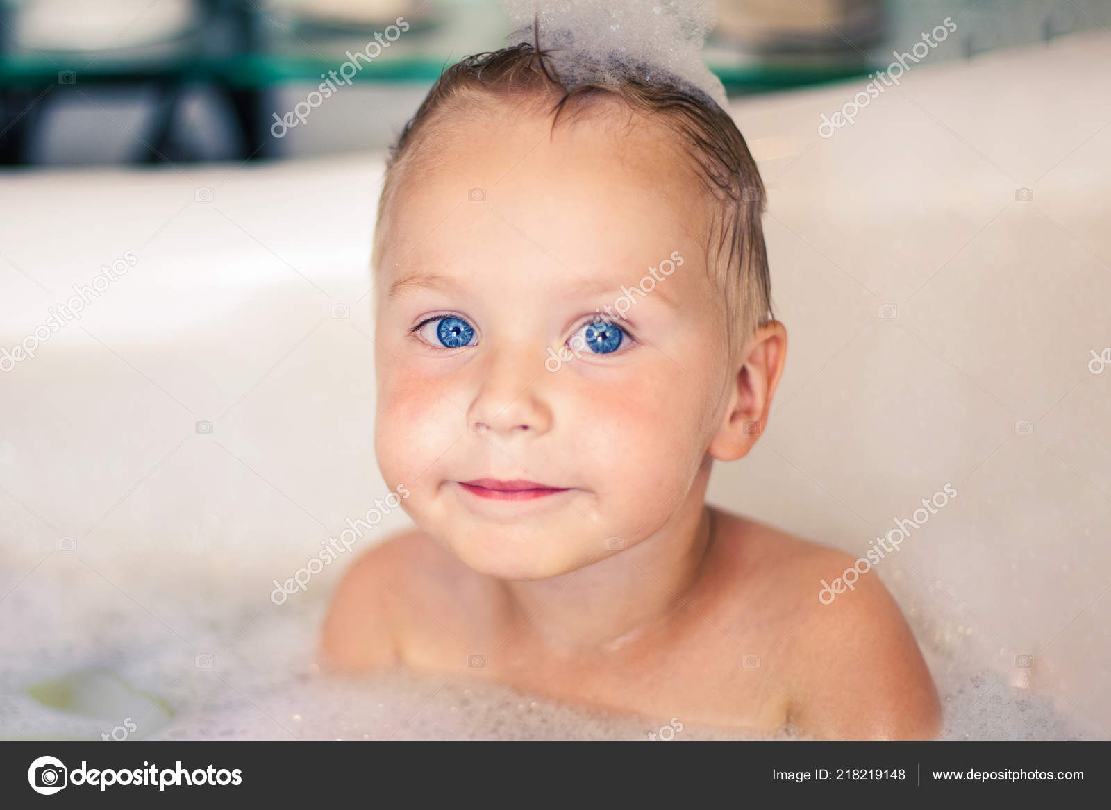 Cute Little Caucasian Boy Bright Blue Eyes Blonde Hair Sits