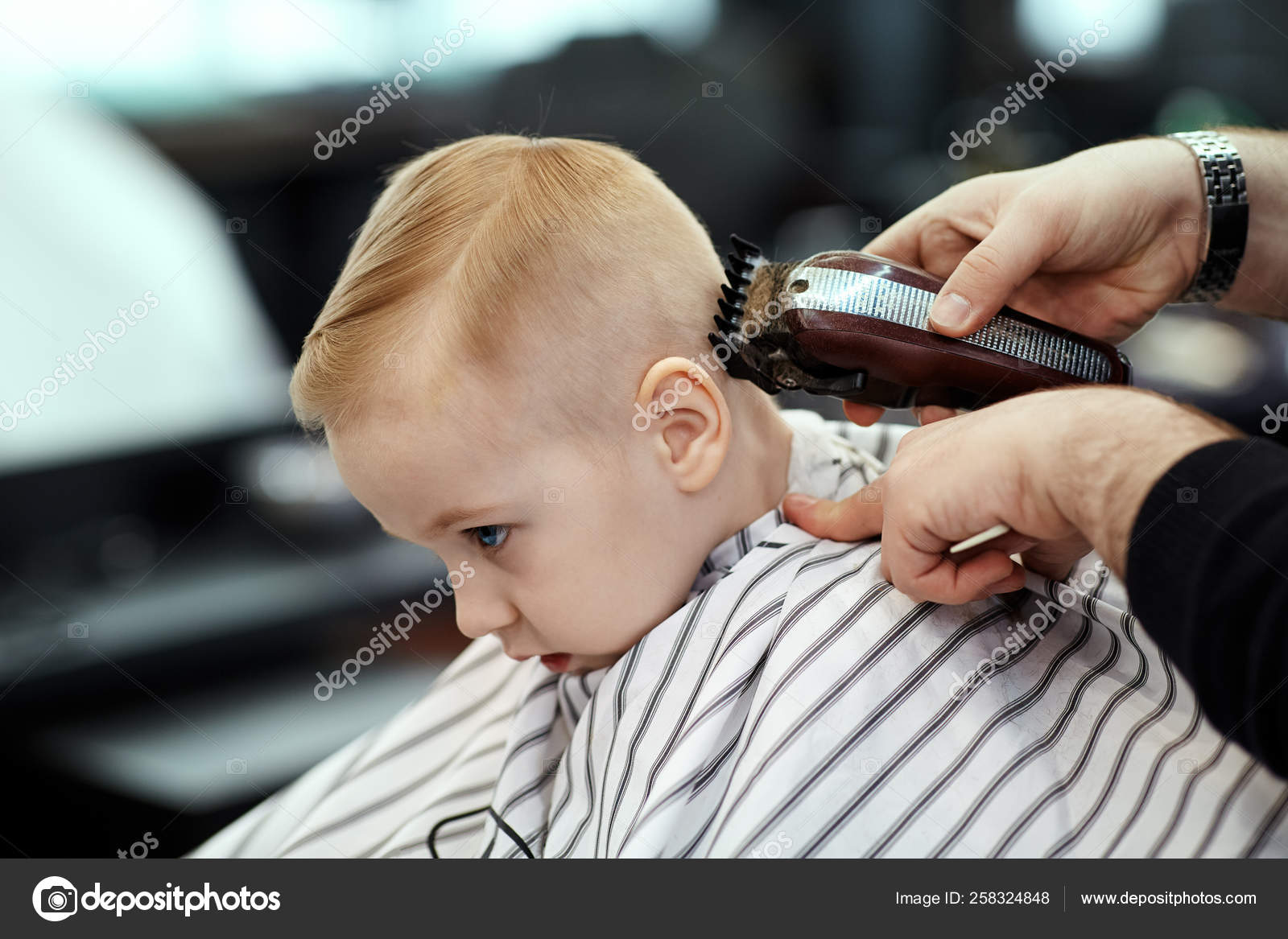 Cute Blond Baby Boy Blue Eyes Barber Shop Having Haircut Stock