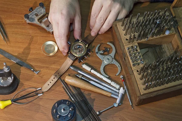 A man repairing a watch