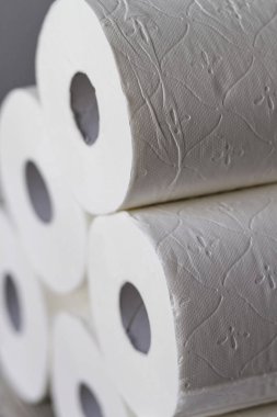 Toilet paper rolls stacked at home
