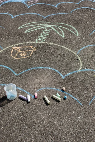 drawings on pavement. children\'s drawings with crayons on the pavement