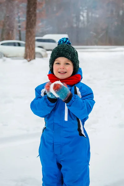 Cheerful Child Sculpts Snowballs Outdoors Winter Day Winter Games — Stock Photo, Image