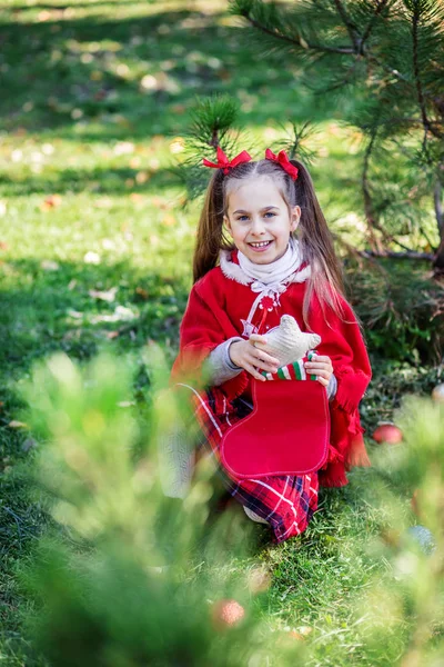 Cute Girl Decorating Christmas Tree Outdoors Yard Holidays Merry Christmas — Stock Photo, Image