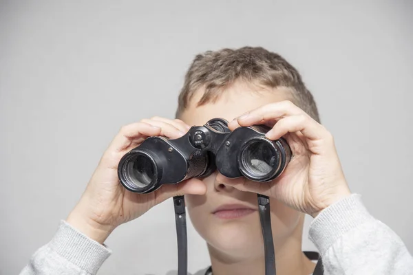 Boy Looks Black Binoculars Future White Background — Stock Photo, Image