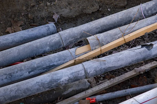 Supply Pipes Street Being Repaired Puddle Water — Stock Photo, Image