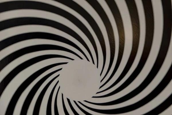 Black white pattern rotating as background — Stockfoto