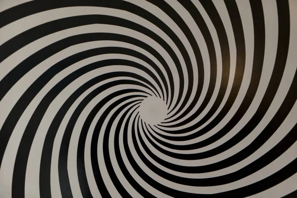 black white pattern rotating as background