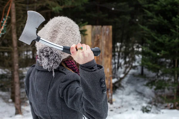 Girl Dressed Winter Clothes Holds Axe Front Wooden Board Part — Stock Photo, Image