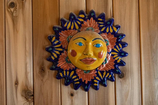 Symbolic & cultural sun face wall art. — Stock Photo, Image