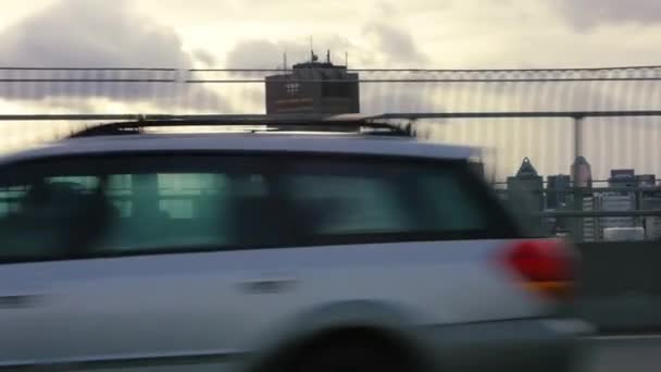 Driving scene on bridge city metropolis on horizon — Stock Video