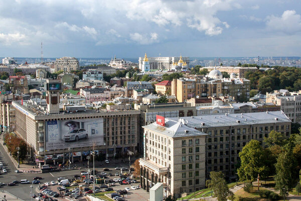 View of the town from the window of the Hotel "Ukraina". Kiev, Ukraine, 2011.08.18. Monument on the central square of Kiev.