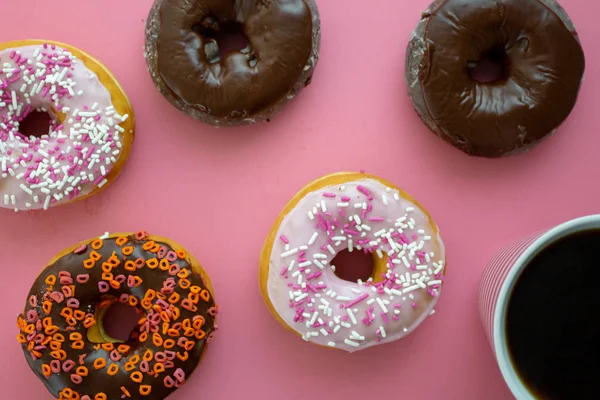 Colorful Donuts Pink Table Being Served Breakfast Piping Hot Coffee — Stock Photo, Image