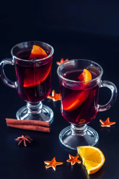 Festive mulled wine on the dark background. — Stock Photo, Image