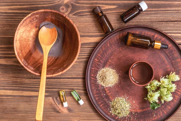 stock image Preparing homemade mask with clay. A lot of ingredients for home made cosmetics in background