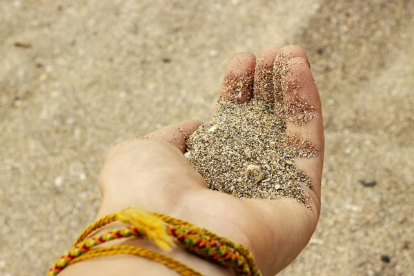 Sand from small crushed shells on Kuta beach. — Stock Photo, Image
