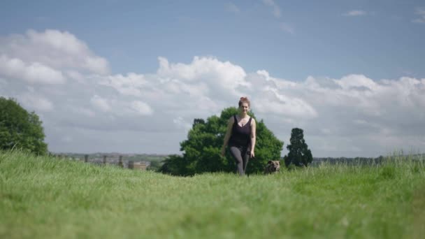 Young Woman Walking Pet Dog Leash Park Green Meadow Summer — Stock Video