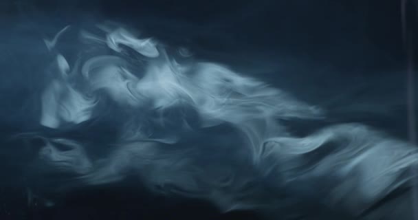 Textura Humo Sobre Fondo Azul Negro Con Rayos Luz Solar — Vídeos de Stock