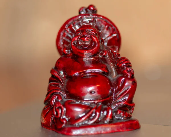 Bir oturma figürü Buda