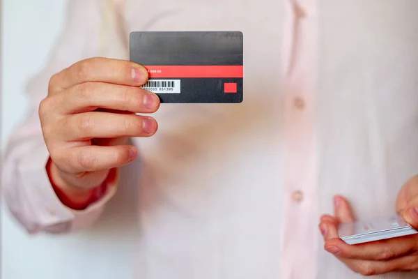 credit card. online payments security. man holding plastic cards