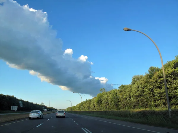 Large Long Funnel Cloud Crossing Highway — Stock Photo, Image