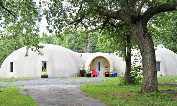 Dome house with arches to door