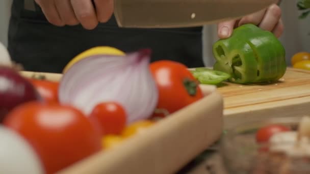 Professional Chef Prepares Cuts Green Bell Pepper Close Slow Motion — Stock Video