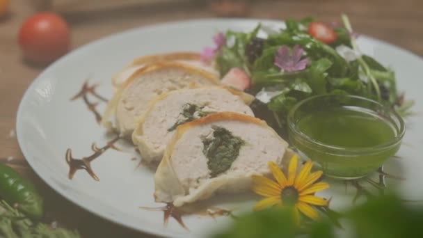 Chicken Roll Spinach Nicely Served Plate Greens Flower Decorations Green — Stock Video