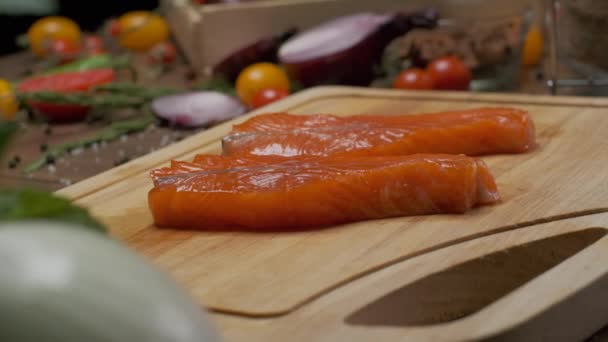 Two Steak Ready Slices Salmon Cutting Board Close Slow Motion — Stock Video
