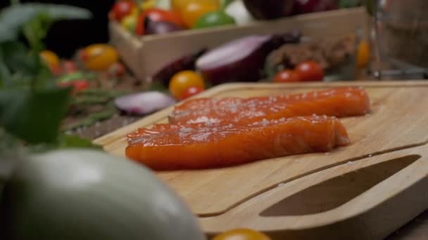 Two Steak Ready Slices Salmon Cutting Board Close Slow Motion — Stock Video