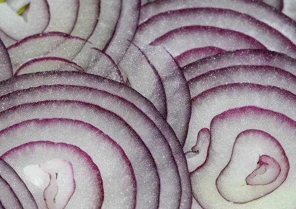 Thinly sliced blue onion rings, onion texture